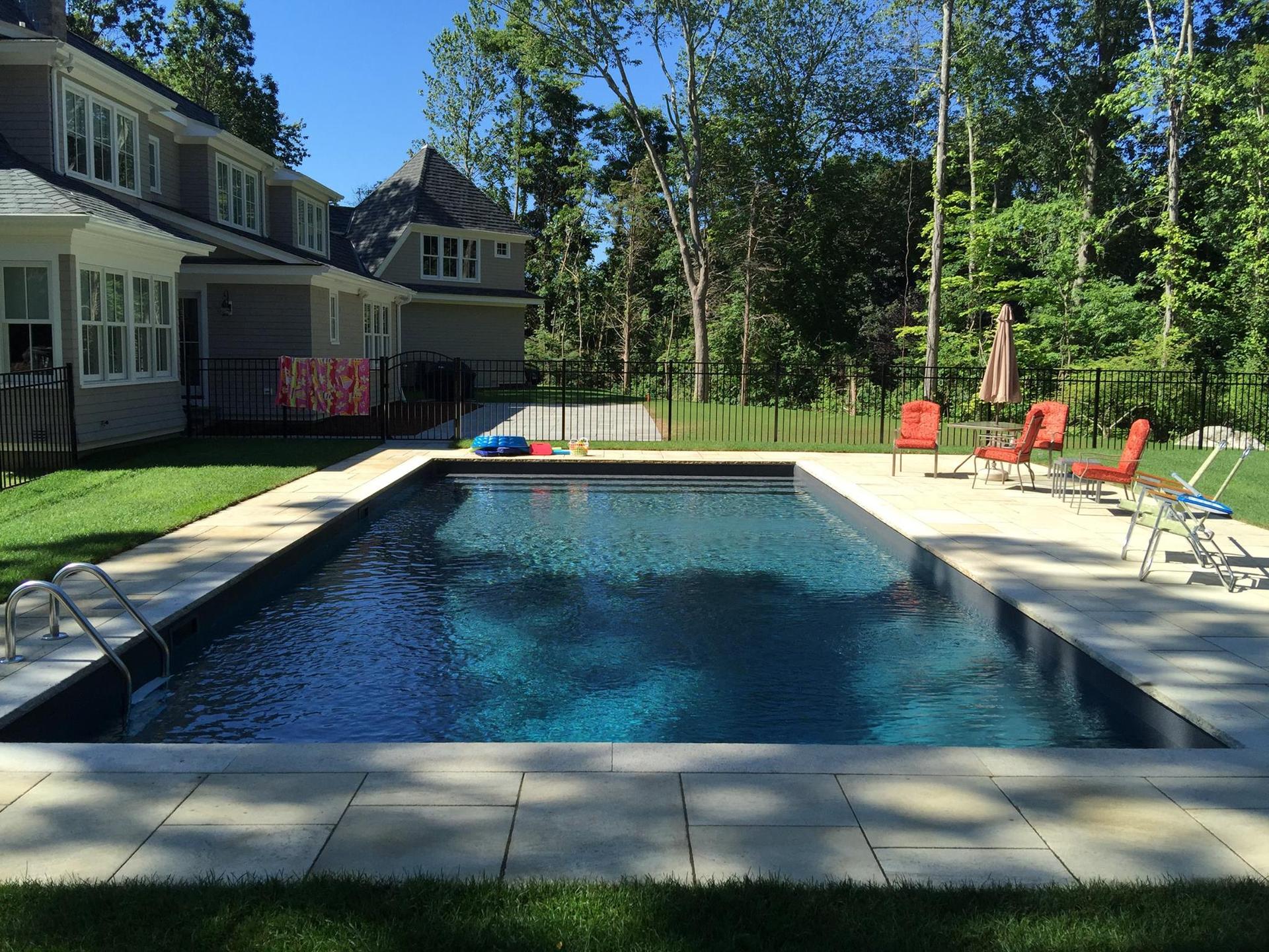 Residential pool showing signs it needs weekly maintenance in Guilford, CT