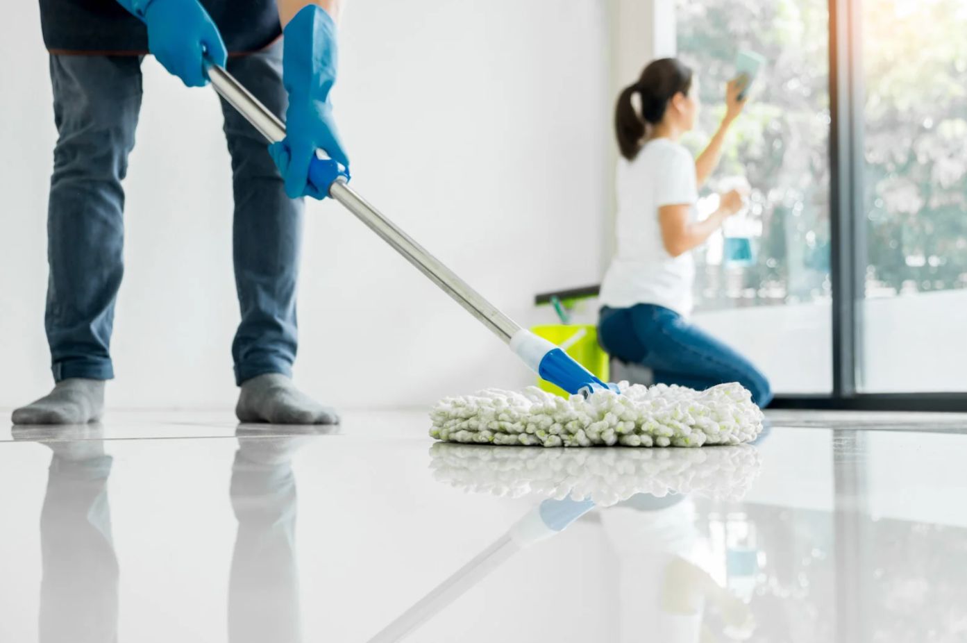 Cleaning tile flooring with a mop