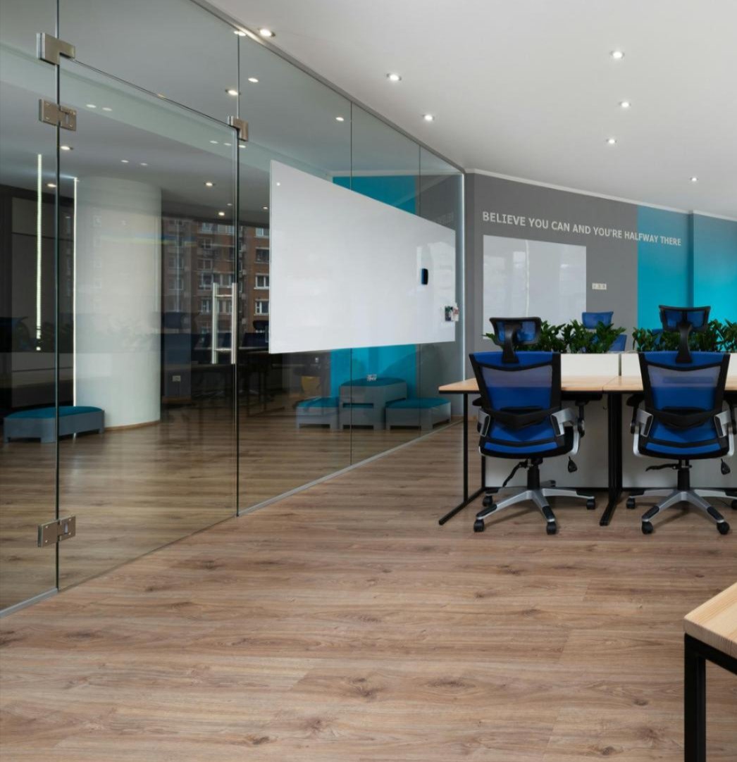 Commercial vinyl flooring in an Orlando office showing the need for professional LVP/LVT cleaning and restoration