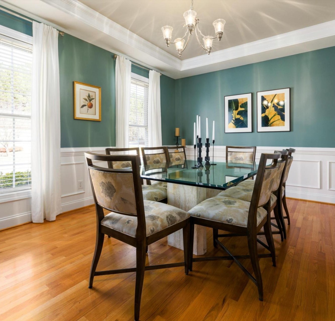 Dining room in a Cañon City, CO home featuring professionally installed hardwood flooring Dining room in a Cañon City, CO home featuring professionally installed hardwood flooring