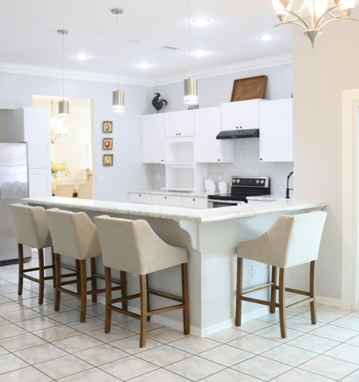 Bright kitchen in a Cotopaxi, CO home featuring professionally installed tile flooring by Floor & Window Covering Connection Bright kitchen in a Cotopaxi, CO home featuring professionally installed tile flooring by Floor & Window Covering Connection