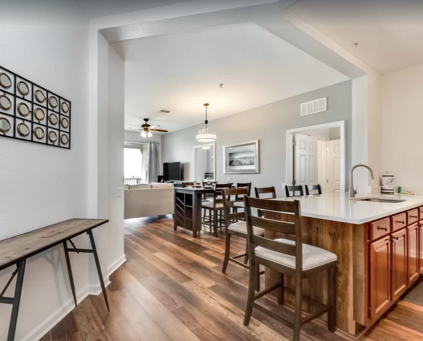 a room with a table and chairs