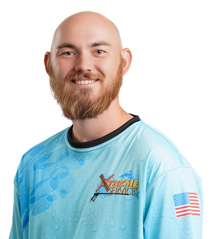Portrait of team in Xtreme Services company uniform