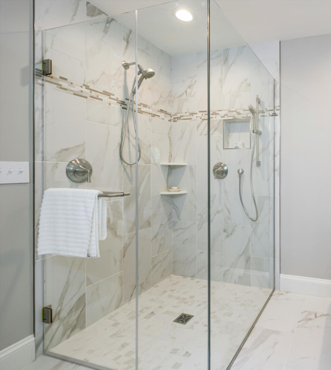 Newly installed tile shower flooring & surrounding design in Sallisaw, OK by Quality Floors