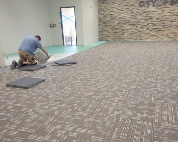 Expert flooring installer in Eastern Oklahoma laying carpet tiles with over 75 years of combined installation experience Expert flooring installer in Eastern Oklahoma laying carpet tiles with over 75 years of combined installation experience