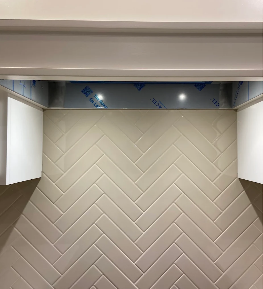 Newly installed tile backsplash in Sallisaw, OK by Quality Floors