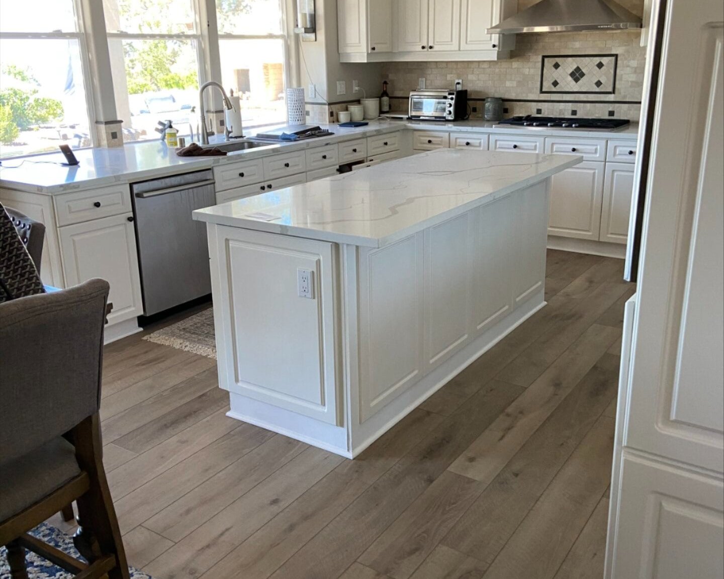 Laminate Flooring in a Kitchen With Cabinets