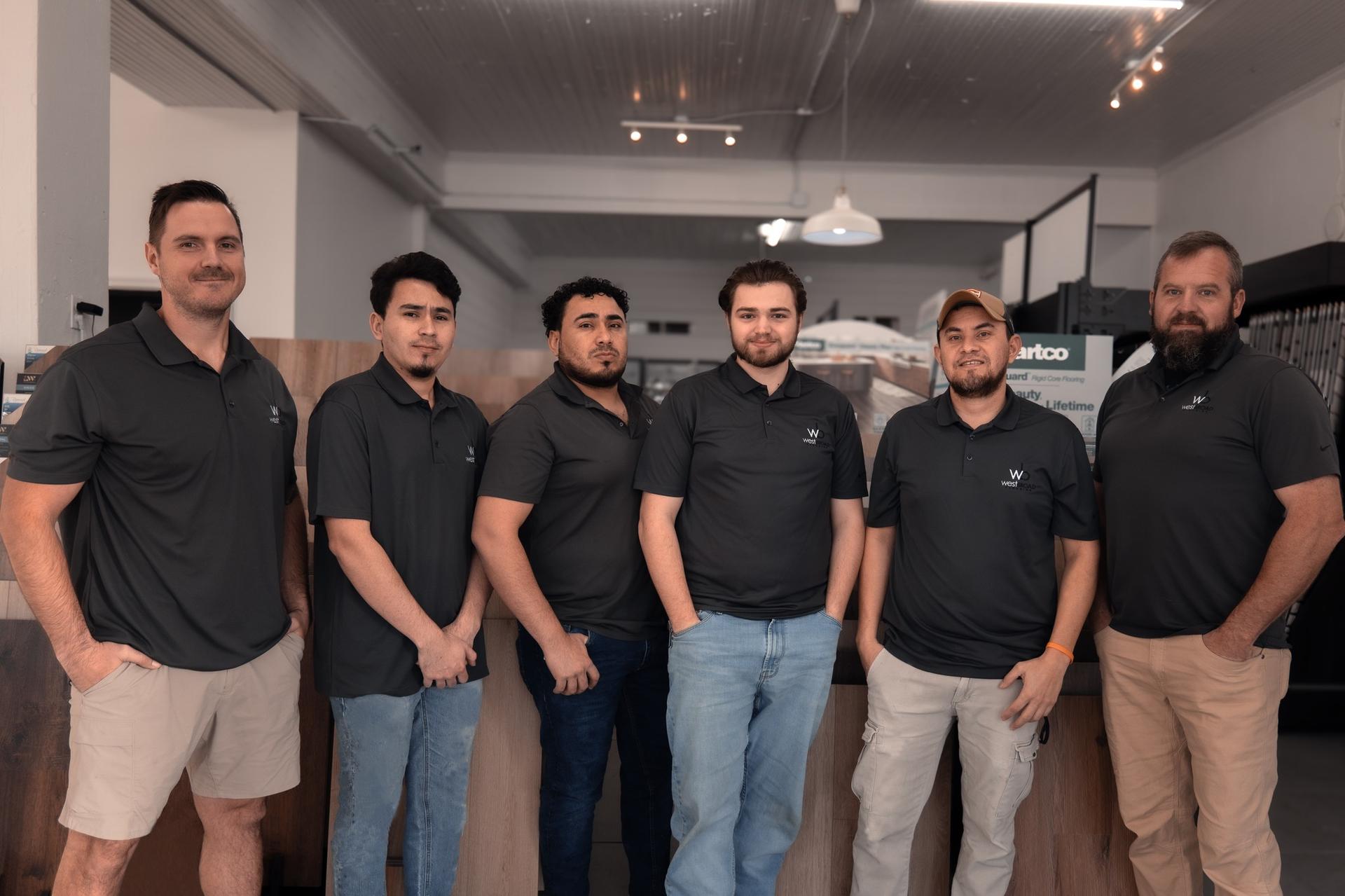 Professional flooring specialists from West Broad Flooring pictured in their showroom, serving homeowners and businesses with expert flooring selection and installation Professional flooring specialists from West Broad Flooring pictured in their showroom, serving homeowners and businesses with expert flooring selection and installation