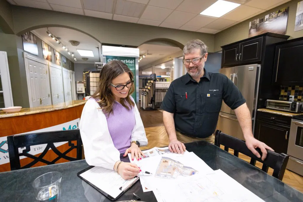 Contractor and trade consultant reviewing floor plans at FloorMe!