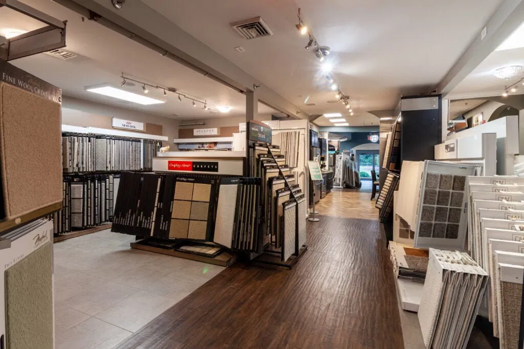 The inside of the FloorMe! showroom featuring carpet samples