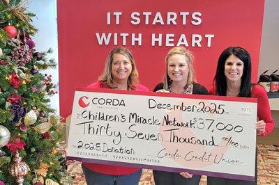 Corda CEO/President Paula O'Rourke and CMN Representatives at our 2025 check presentation