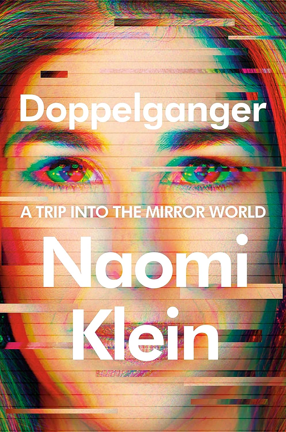 Book cover for Doppelganger by Naomi Klein which features here face fractured with digital effects with the title and her name in white text.  