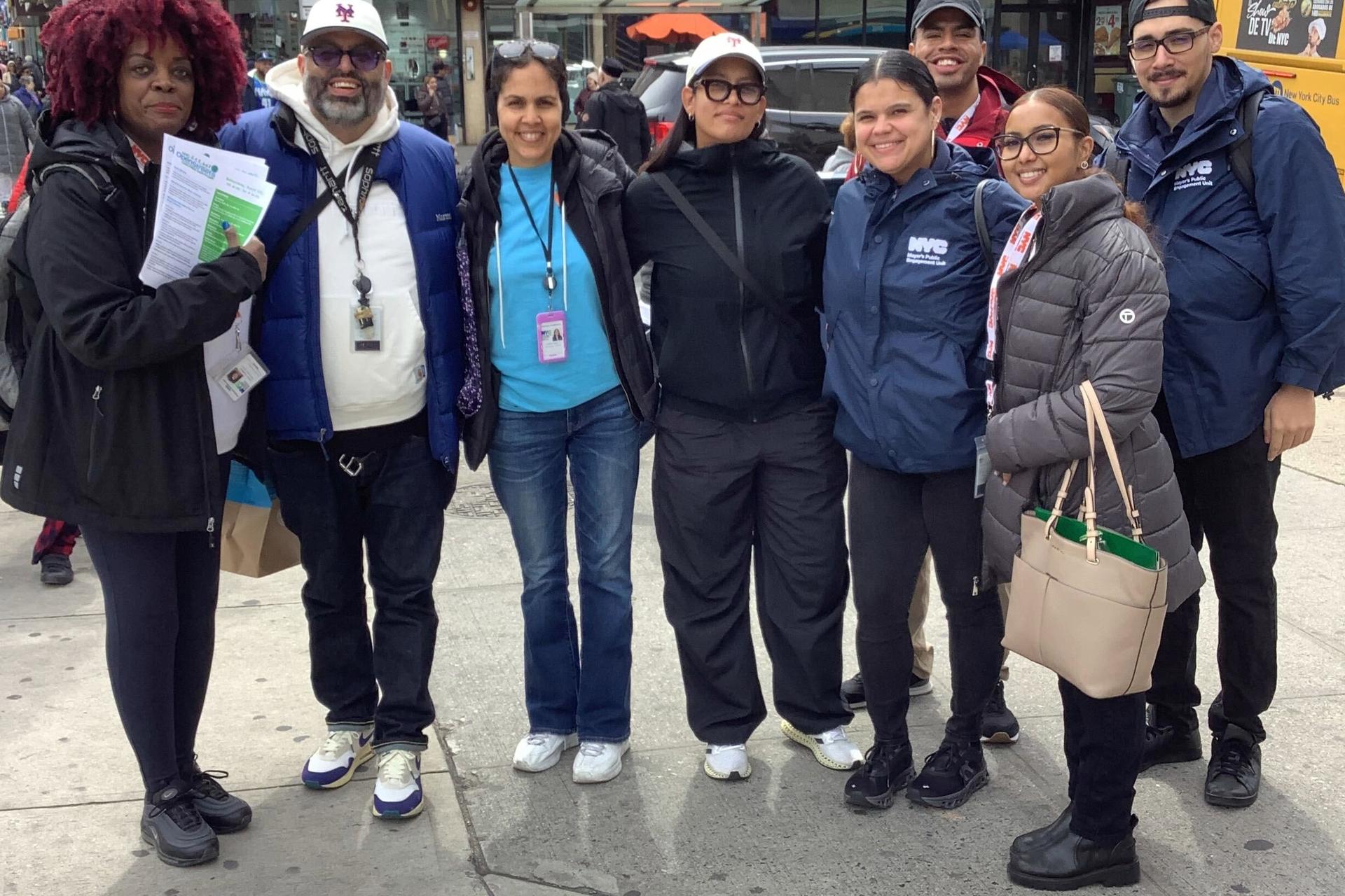 A group of PEU members posing in the street.