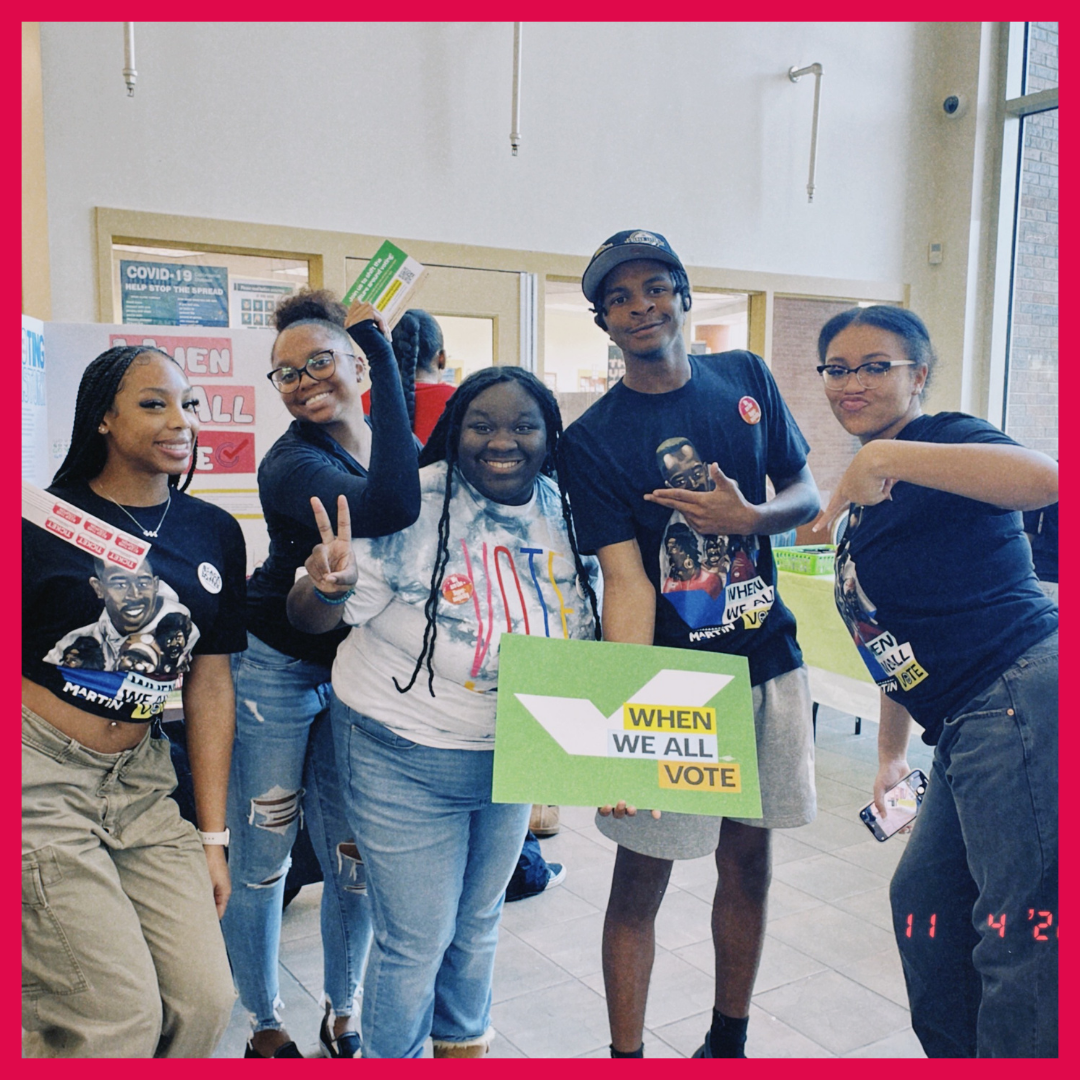 Photo of Shavonne Hines-Foster with volunteers at a voter registration event. 
