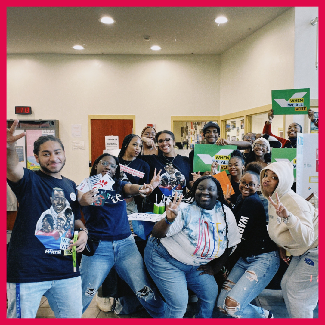 Photo of Shavonne Hines-Foster with volunteers at a voter registration event. 