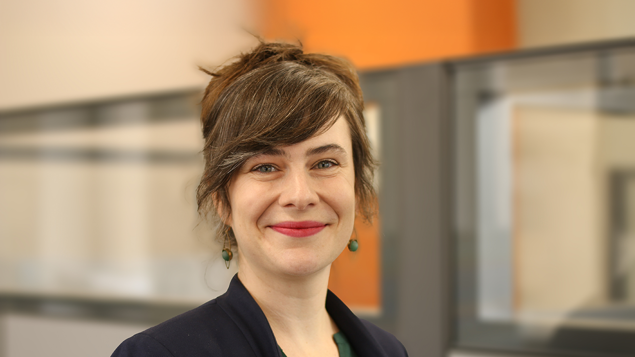 Headshot of Margaret Cherne-Hendrick smiling in Fresh Energy office