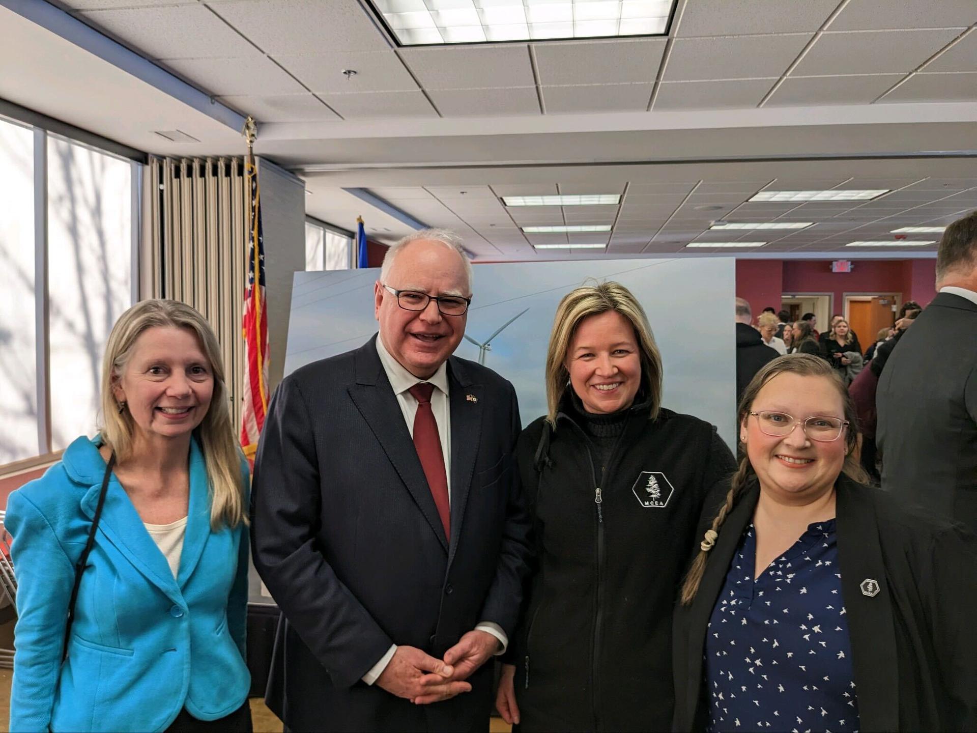 Pictured: (left) MCEA Climate Program Director Ellen Anderson speaks at a press conference prior to the House vote on 100% bill. (right) Rep. Jamie Long takes a selfie with clean energy supporters outside the House chambers (1/26/23)