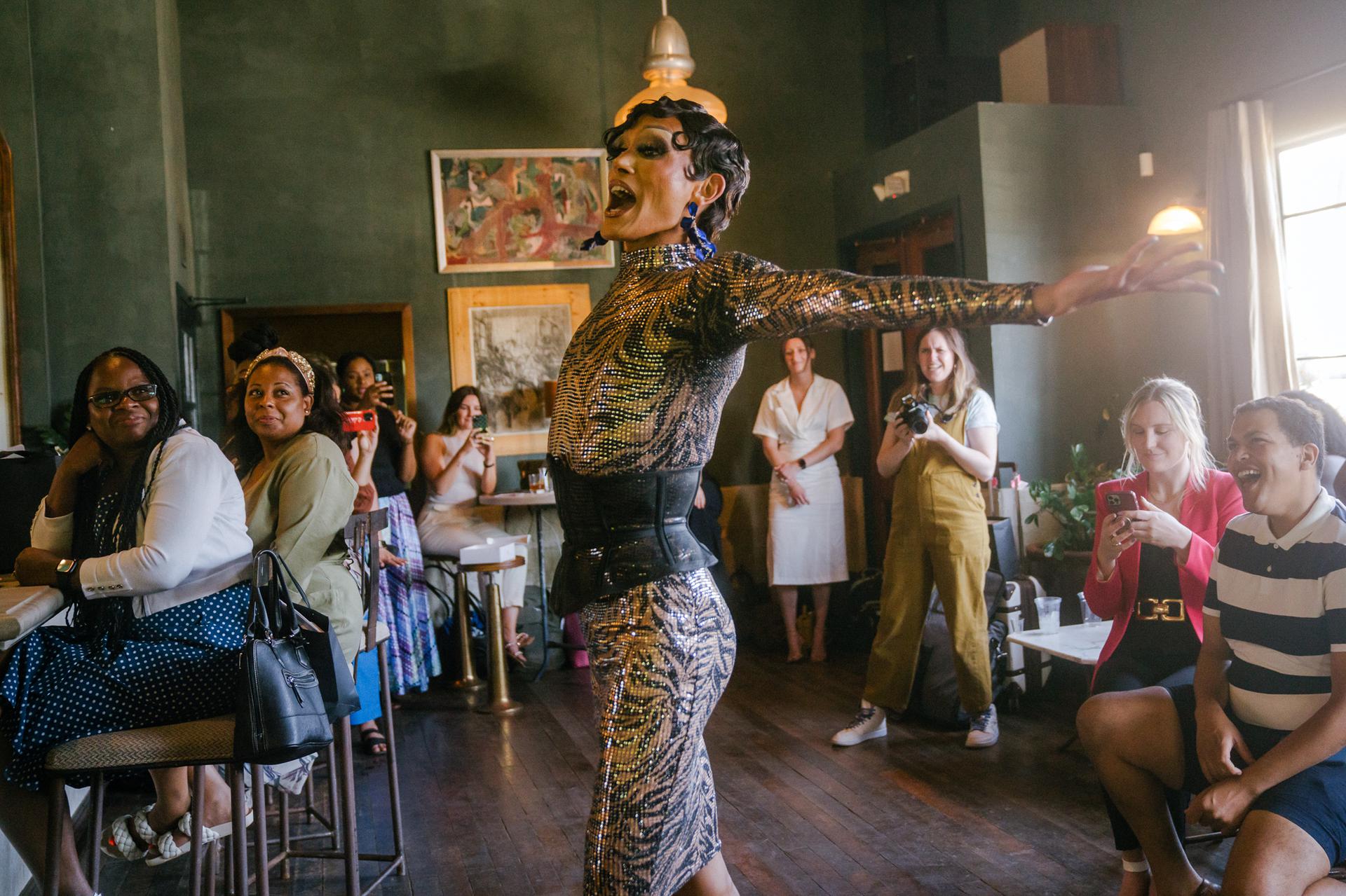 Performer from our partners at Drag Out the Vote perform at an event during the Culture of Democracy Summit in 2022.