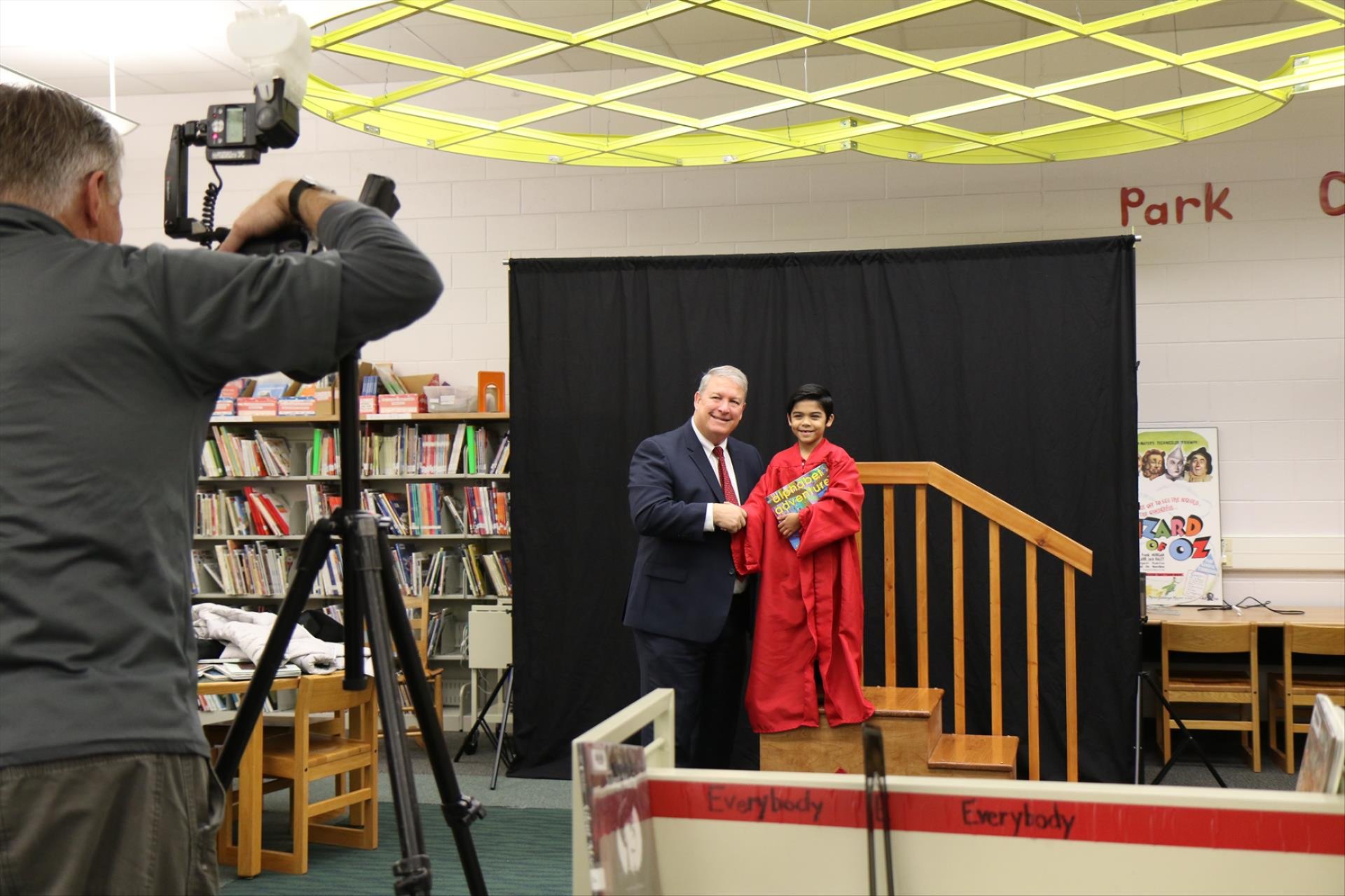 Dr. Scott Poses with Kindergarten Student at Park Creek