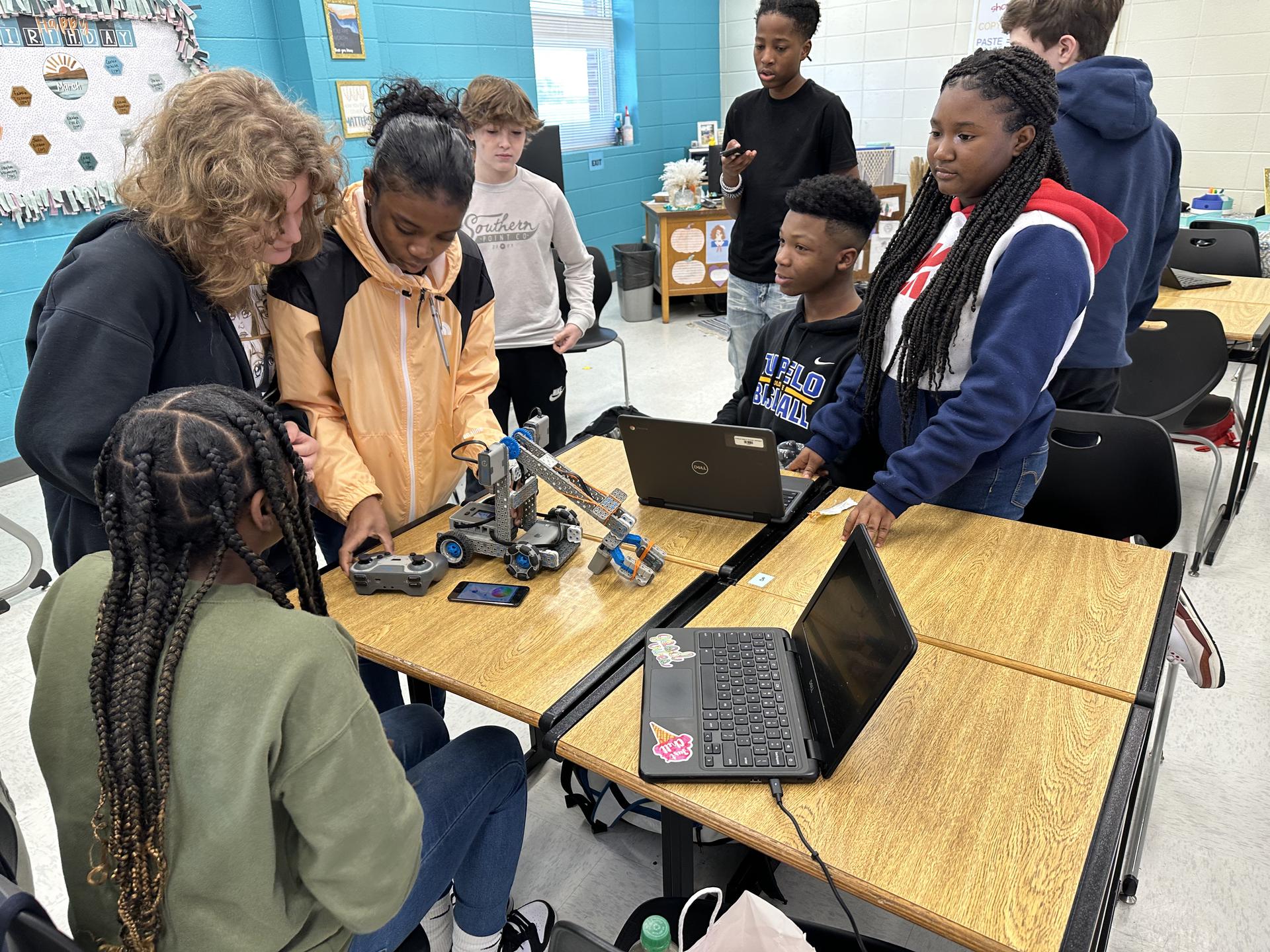 8th grade computer science and engineering students demonstrate their
