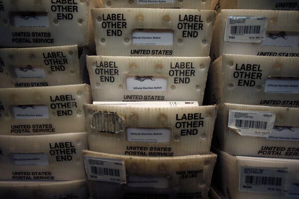 Federal Chairman Powell speaking at podium in front of flag