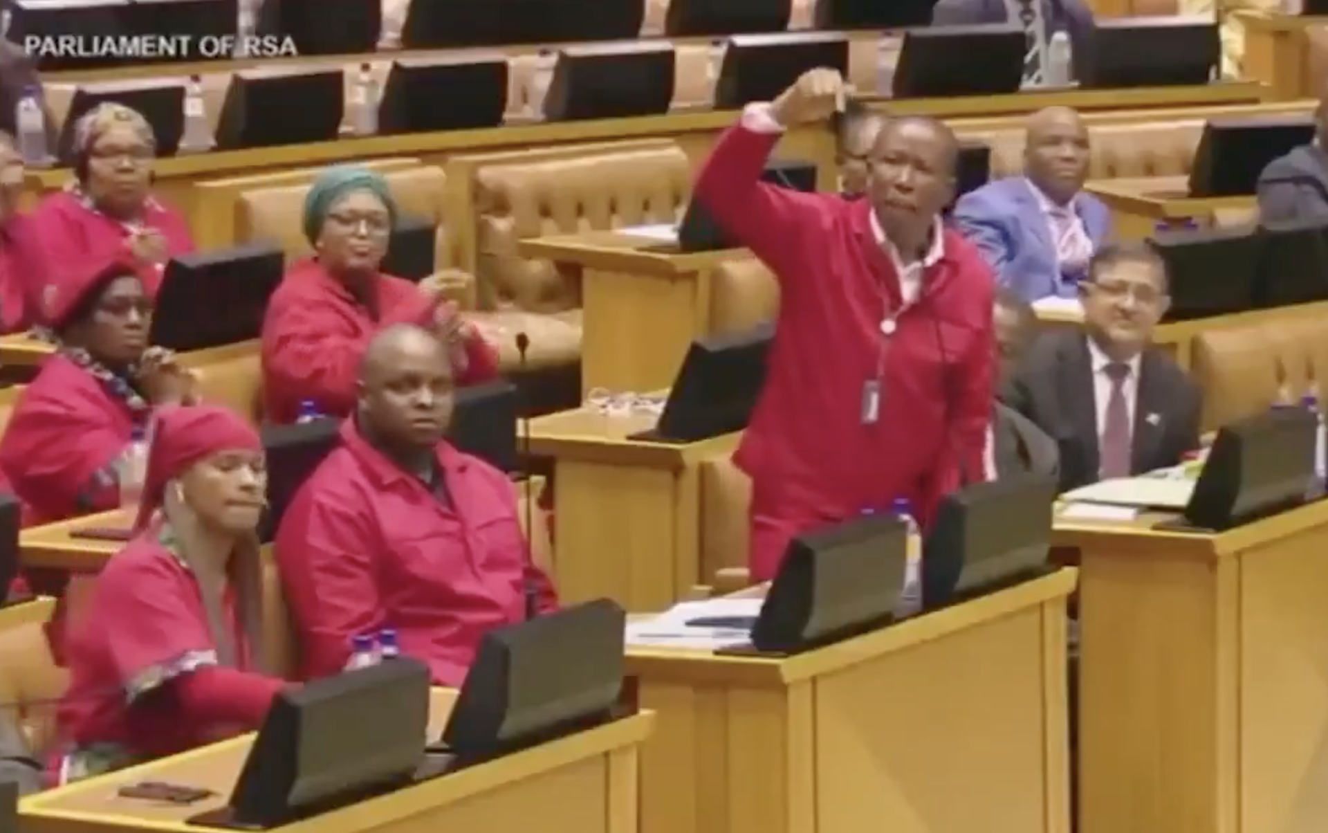 Trump ambushes South African president at White House by playing damning video calling for 'genocide' of white farmers