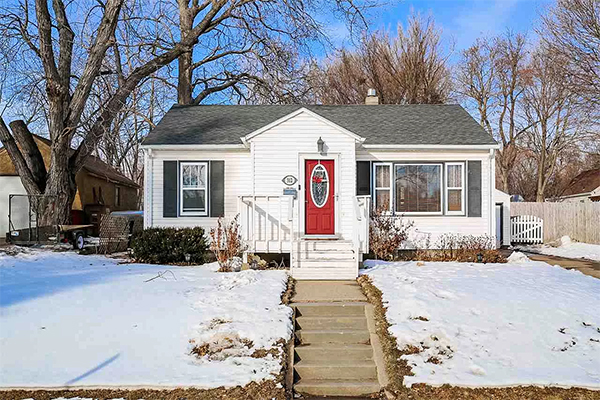 White home with red door