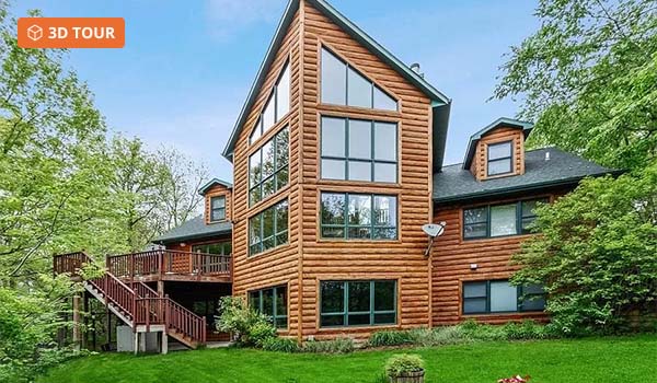 Modern log cabin with high windows