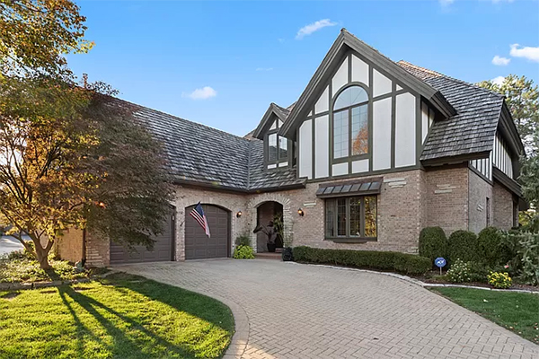 Tudor style brick home with double garage