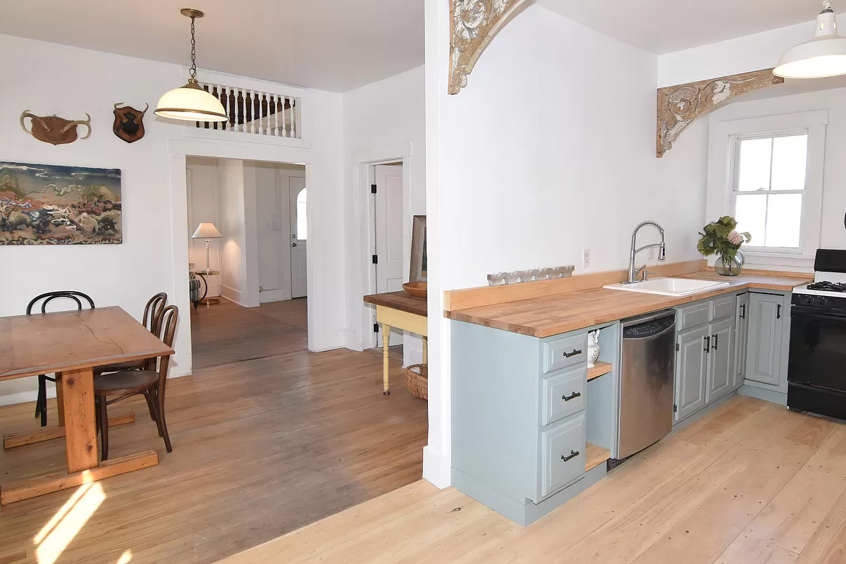 kitchen and dining room with wood floors