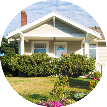 pretty house with green front lawn