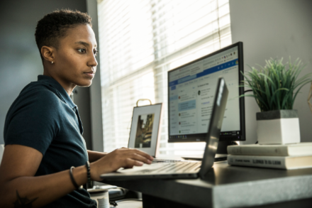 Woman sitting at computer