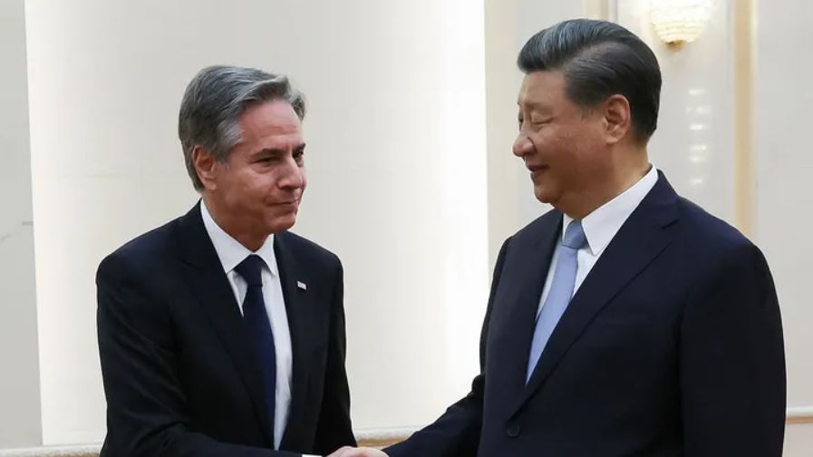 Chinese President Xi Jinping, right, and U.S. Secretary of State Antony Blinken