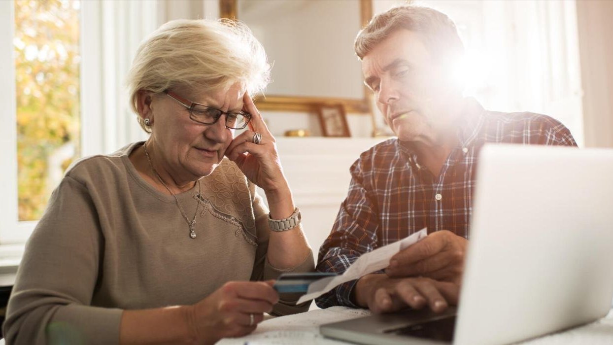 Senior couple reviewing finances