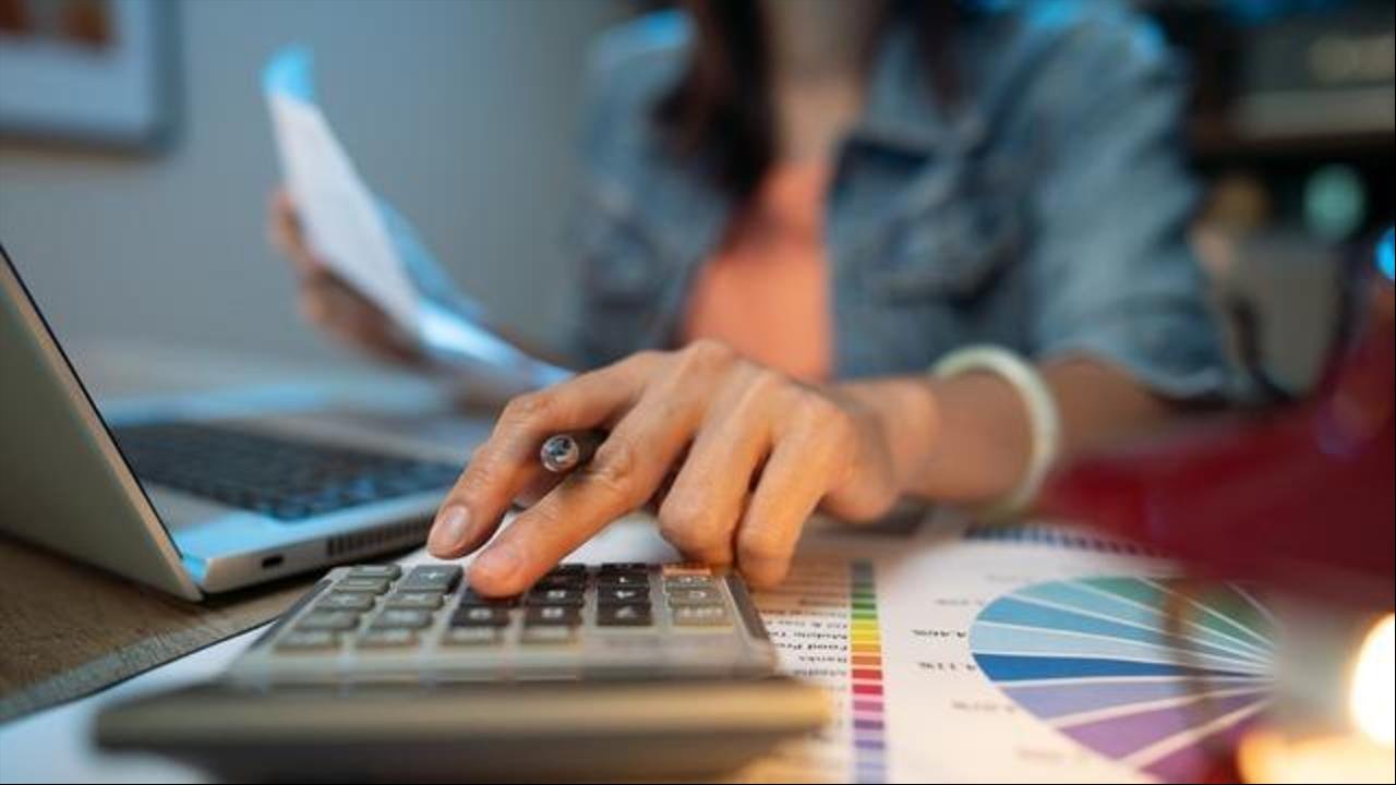 Woman using a calculator