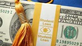 A graduation tassel on top of a stack of money with a wrap reading Student Loan