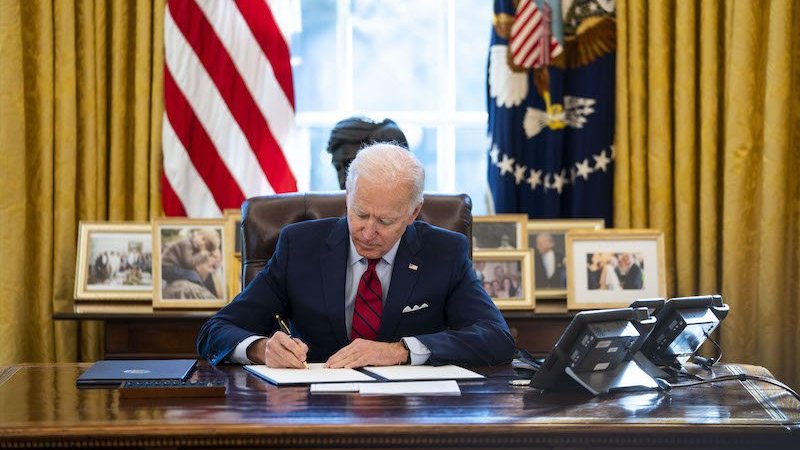 Biden signing an executive order