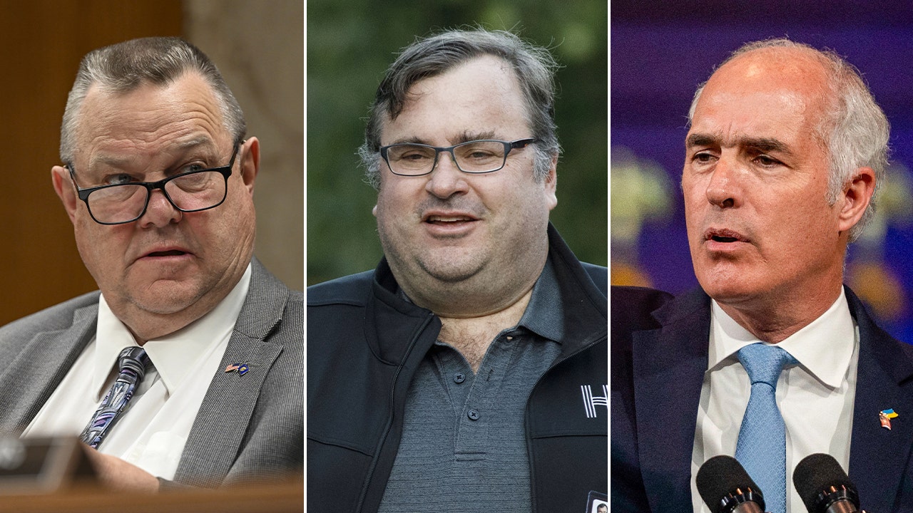 Sen. Jon Tester, D-Mont., (L), LinkedIn co-founder Reid Hoffman (C), and Sen. Bob Casey, D-Pa., (Right) 