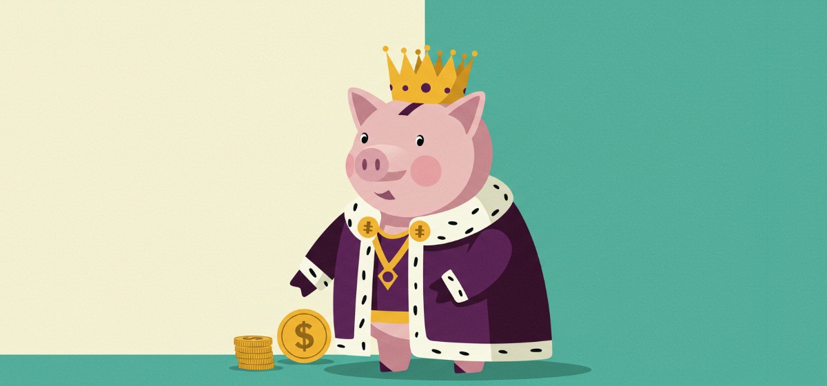 a piggy bank dressed as royalty