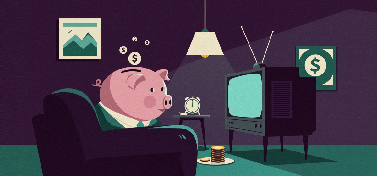a piggy bank watching TV