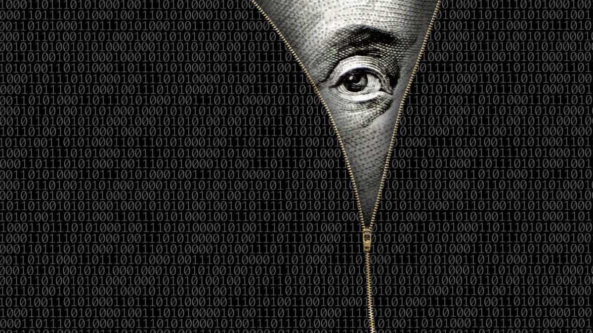 The eye of Benjamin Franklin from currency peeking through a zipper