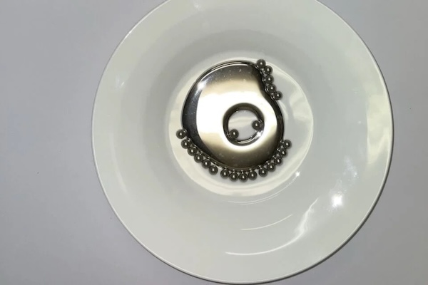 Newly discovered 'hybrid' phase of matter blurs the line between solid and liquid | Gizmodo