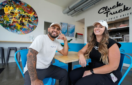 Owners of the Cluck Truck in their new space