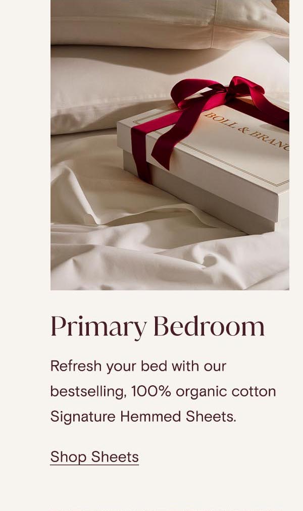 Primary Bedroom | Refresh your bed with our bestselling, 100% organic cotton Signature Hemmed Sheets. Shop Sheets
