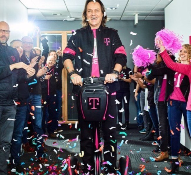 T-Mobile's CEO John Legere on a scooter