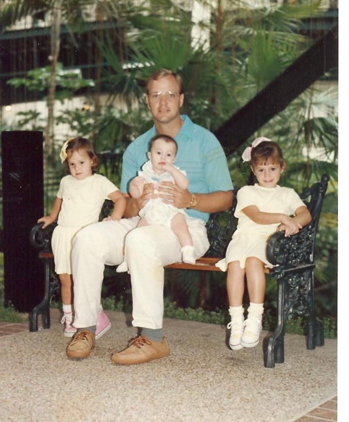 Katie with her dad and siblings