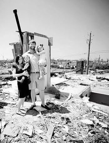 Katie and her family in the ruins of their home