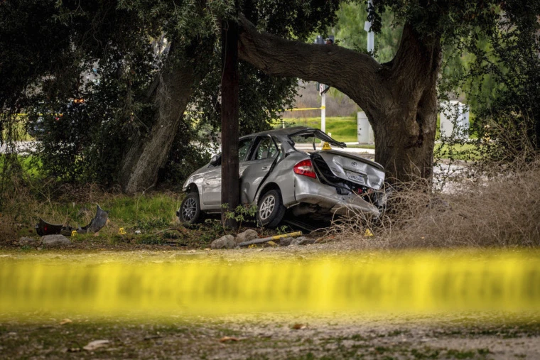 04/200122-hit-run-carona-al-1020-4907bb.jpg Toyota Prius at the scene of a deadly crash