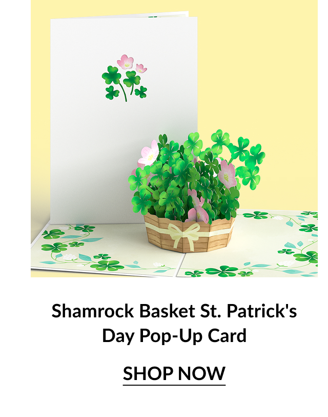 A pop-up card featuring a basket of colorful shamrocks and flowers, perfect for St. Patrick's Day celebrations. Shop now.
