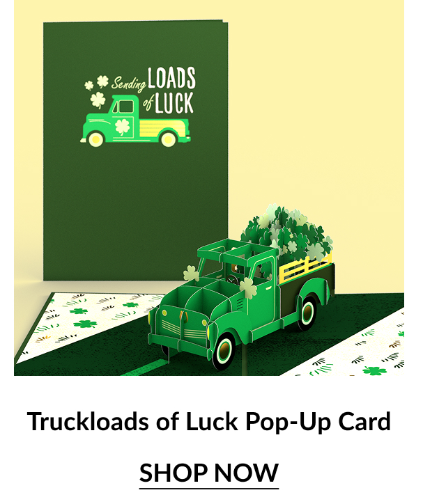 Green pop-up card featuring a vintage truck filled with clovers, with the message ''Sending Loads of Luck.'' Shop Now.